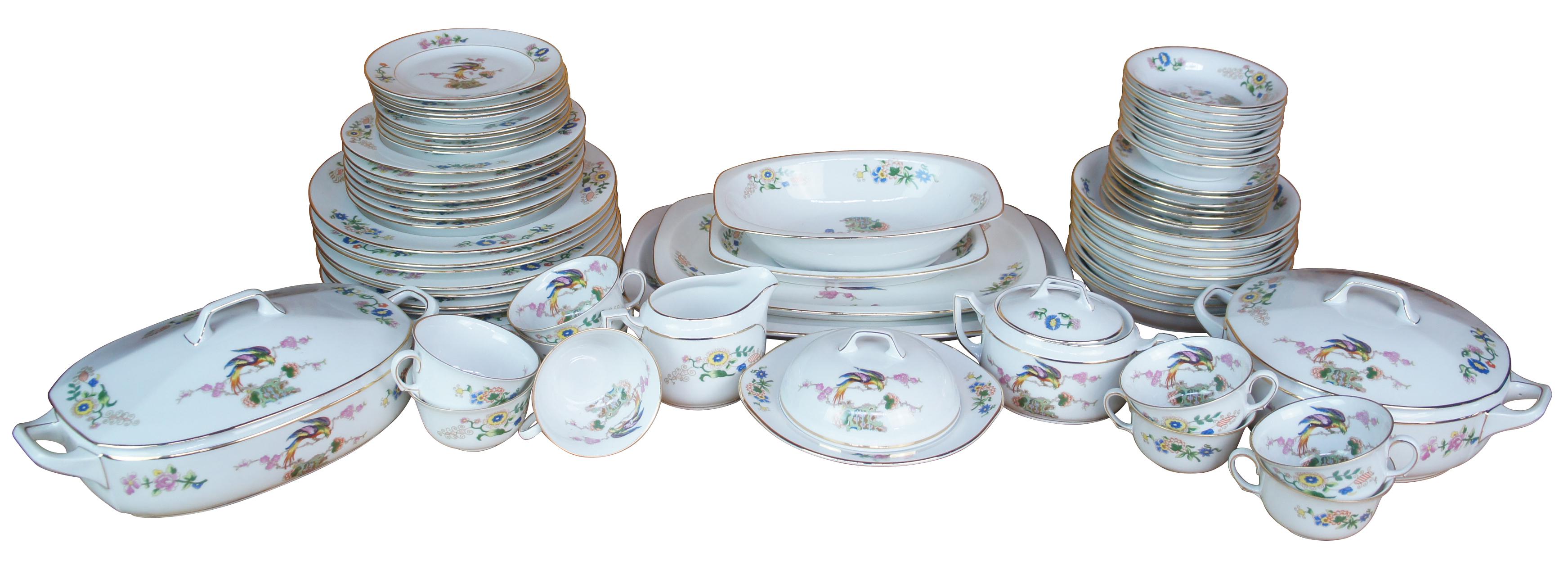 Vintage 6720 by Epiag dinnerware set, circa last quarter of 20th century. Beautifully designed with a bird at the center and floral rim. 

Measures: 9 dinner 10in, 7 salad 8in, 8 bread 6.25in, 8 saucers 5.5in, 8 small bowl 5.25 x1, large platter,