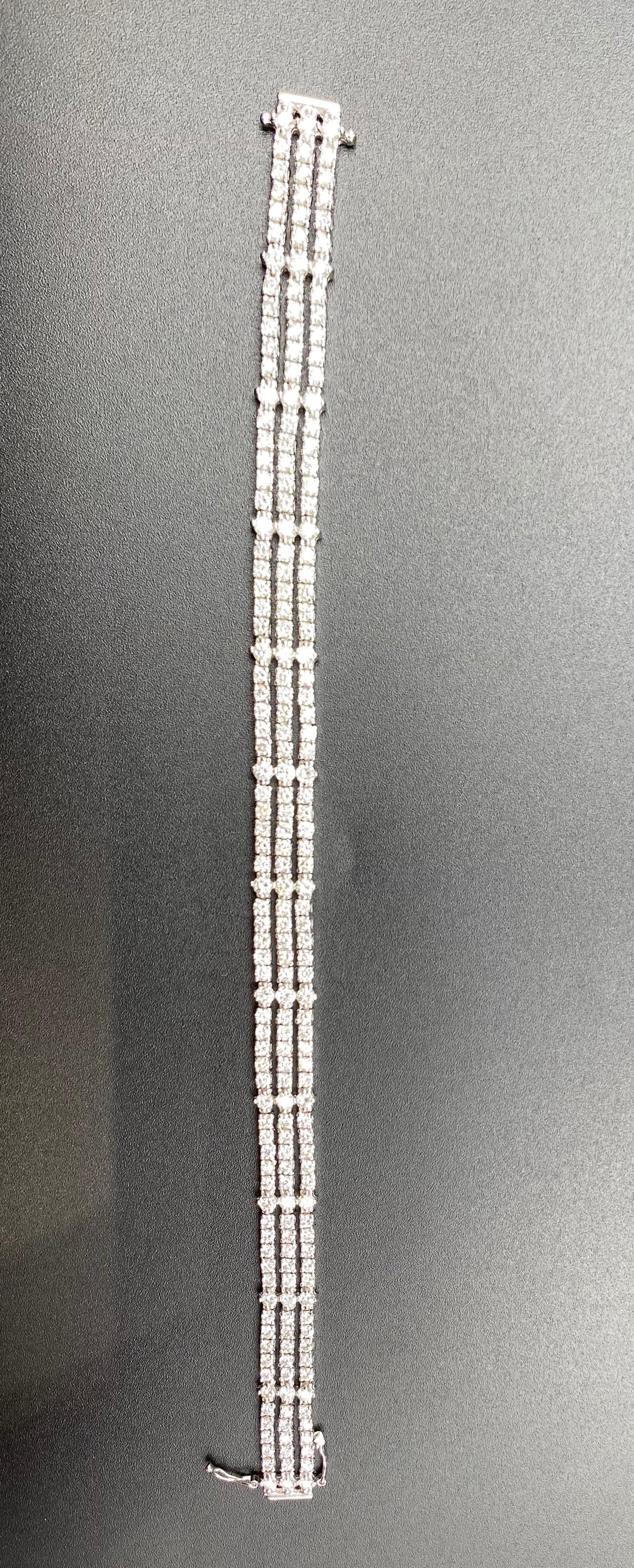The Seva bracelet is an elegant diamond chain tennis bracelet, featuring 7.1 carats of G VS2 Diamonds, set in 18K white gold. 

Diamond Details
Shape: Round  Brilliant 
Color: G 
Clarity: VS2 
Weight- 7.1 carats 

Bracelet Information 
Dimension: