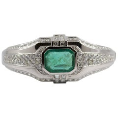 Art Deco 7.10 Carat Emerald 7.40 Carat White Diamond White Gold Clamper Bracelet