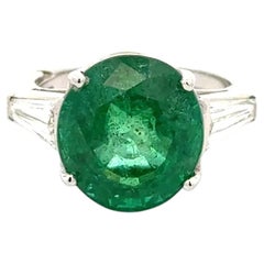 7.10 Carat Round Emerald and Baguette Diamond Platinum Vintage 1970s Ring