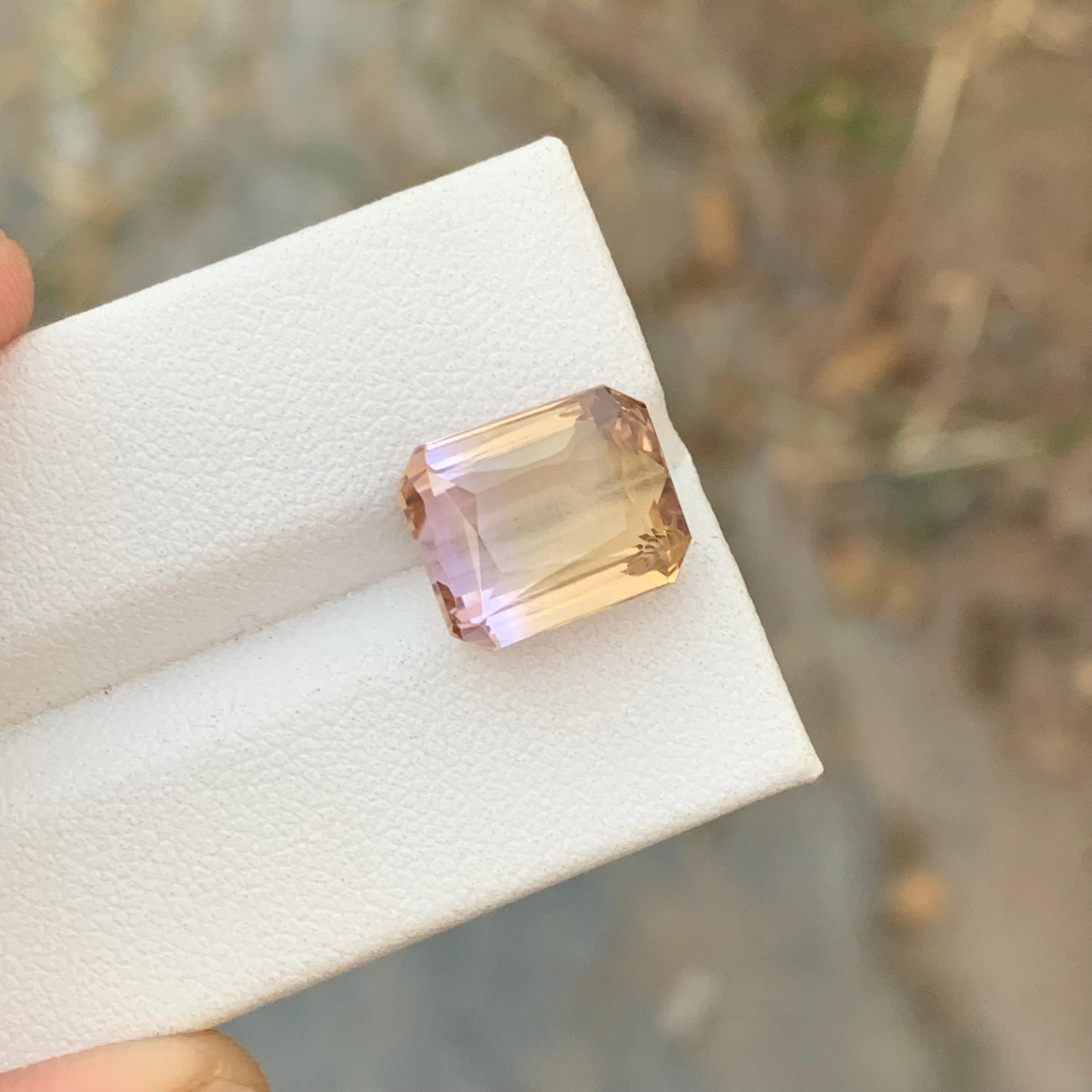 Loose Ametrine
Weight: 7.10 Carats
Dimension: 11.9 x 9.7 x 7.1 Mm
Origin: Brazil
Shape : Emerald 
Treatment: Non
Certificate: On Demand


Ametrine, a captivating and unique gemstone, seamlessly blends the enchanting colors of amethyst and citrine
