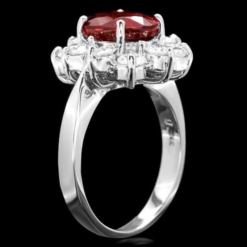 7.10 Carats Natural Red Zircon and Diamond 14K Solid White Gold Ring

Total Natural Zircon Weight is: Approx. 5.40 Carats 

Zircon Measures: Approx. 11.00 x 18.00mm

Natural Round Diamonds Weight: Approx.  1.70 Carats (color G-H / Clarity