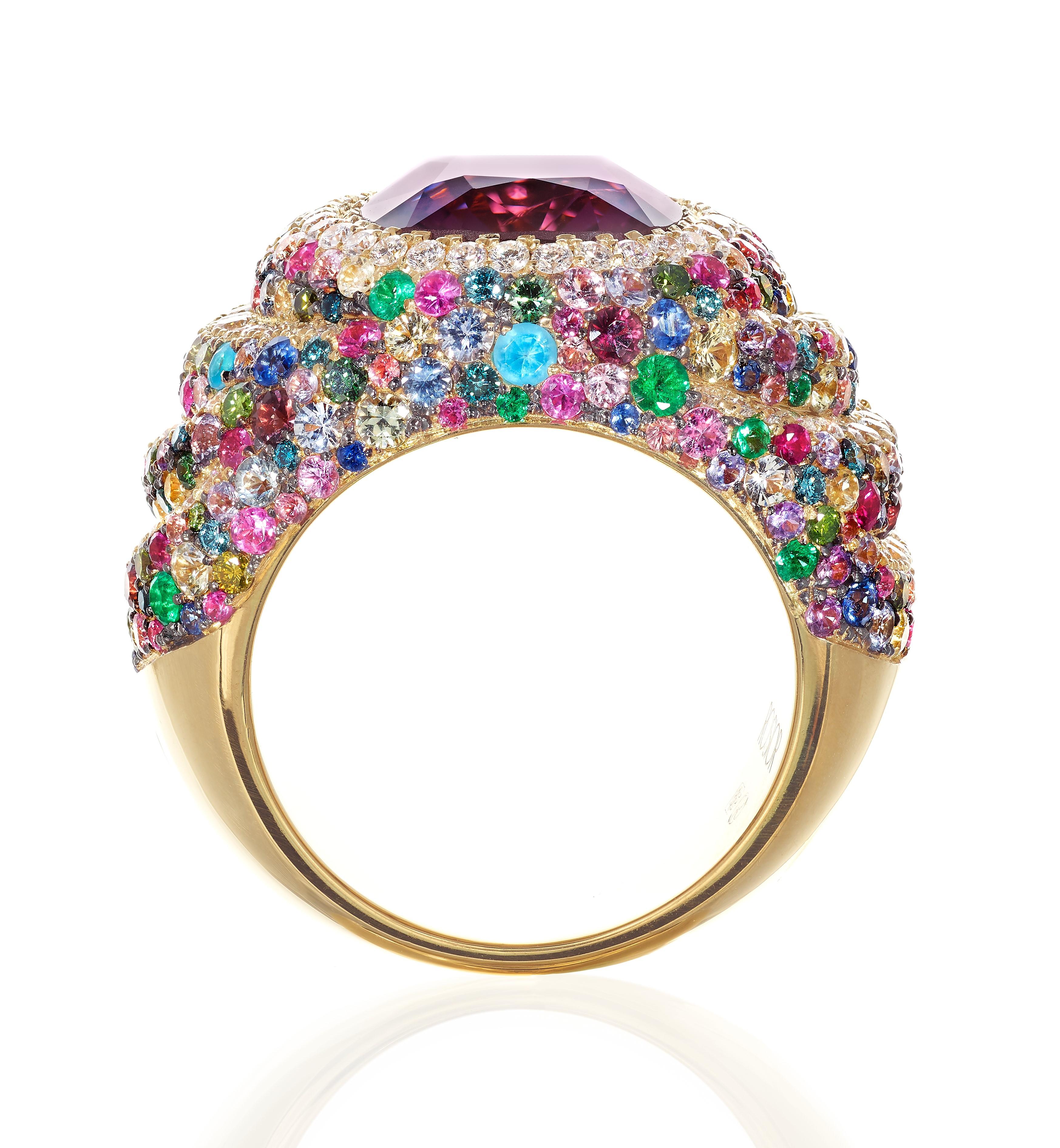Rosior Cocktail Ring set in 19.2k yellow gold:
- 1 Antique Cushion Cut Spinel with 7,10 ct, certified by Lotus Gemmology (Ref. 1269-4043)
- 201 Blue, Pink, Brown and Purple Sapphires with 3,09 ct
- 100 F color, VVS clarity Diamonds with 0,80 ct;
-