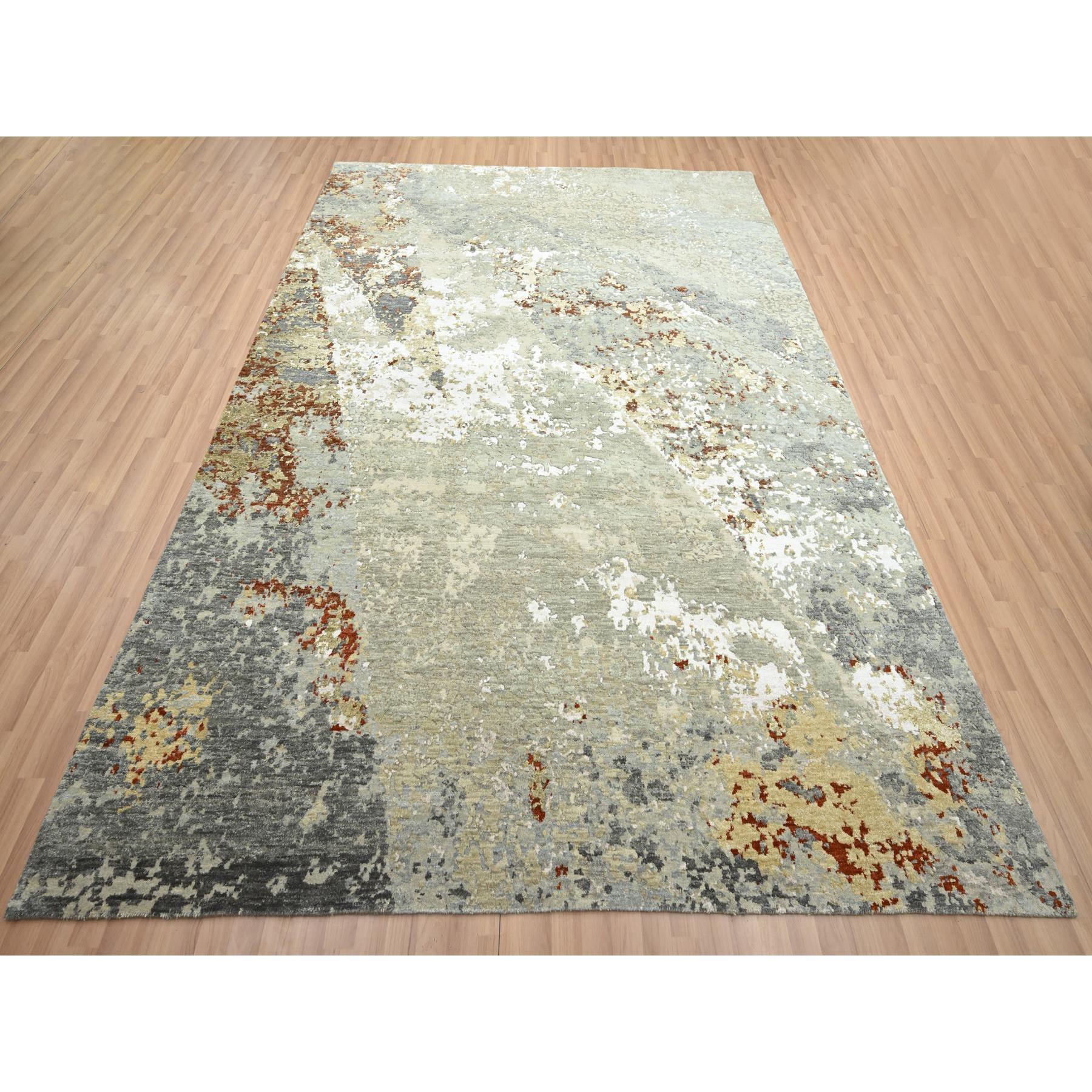 Grautöne, Persischer Knoten, Abstrakt mit Galaxie-Design, Reine Wolle, Handgeknüpft, Dicht gewebt, Orientteppich
Primäre MATERIALIEN: Wolle
Latex: Kein Flor 
Höhe: 0,25 Zoll
Stil: AM Contemporary
Grundfarbe: Grau
Sekundäre Farben: Rot, Braun,