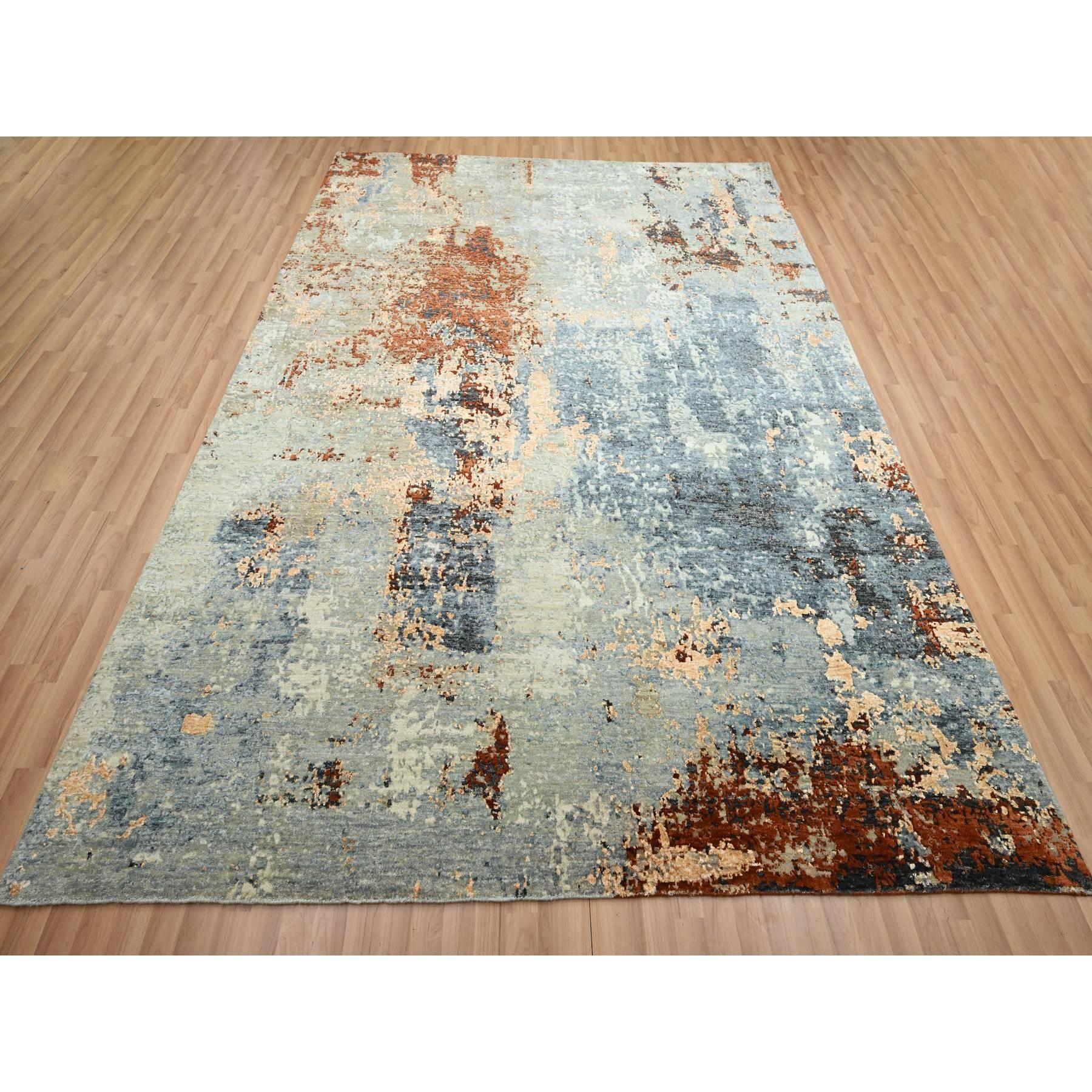 Aegean Blue with Rust Red, Hand Knotted, Abstract with Galaxy Design, Persian Knot, 100% Wool, Densely Woven, Oriental Rug
Primary materials: Wool
Latex: No Pile 
height: 0.25 Inches
Style: Contemporary
Primary color: Blue
Secondary colors: Ivory,