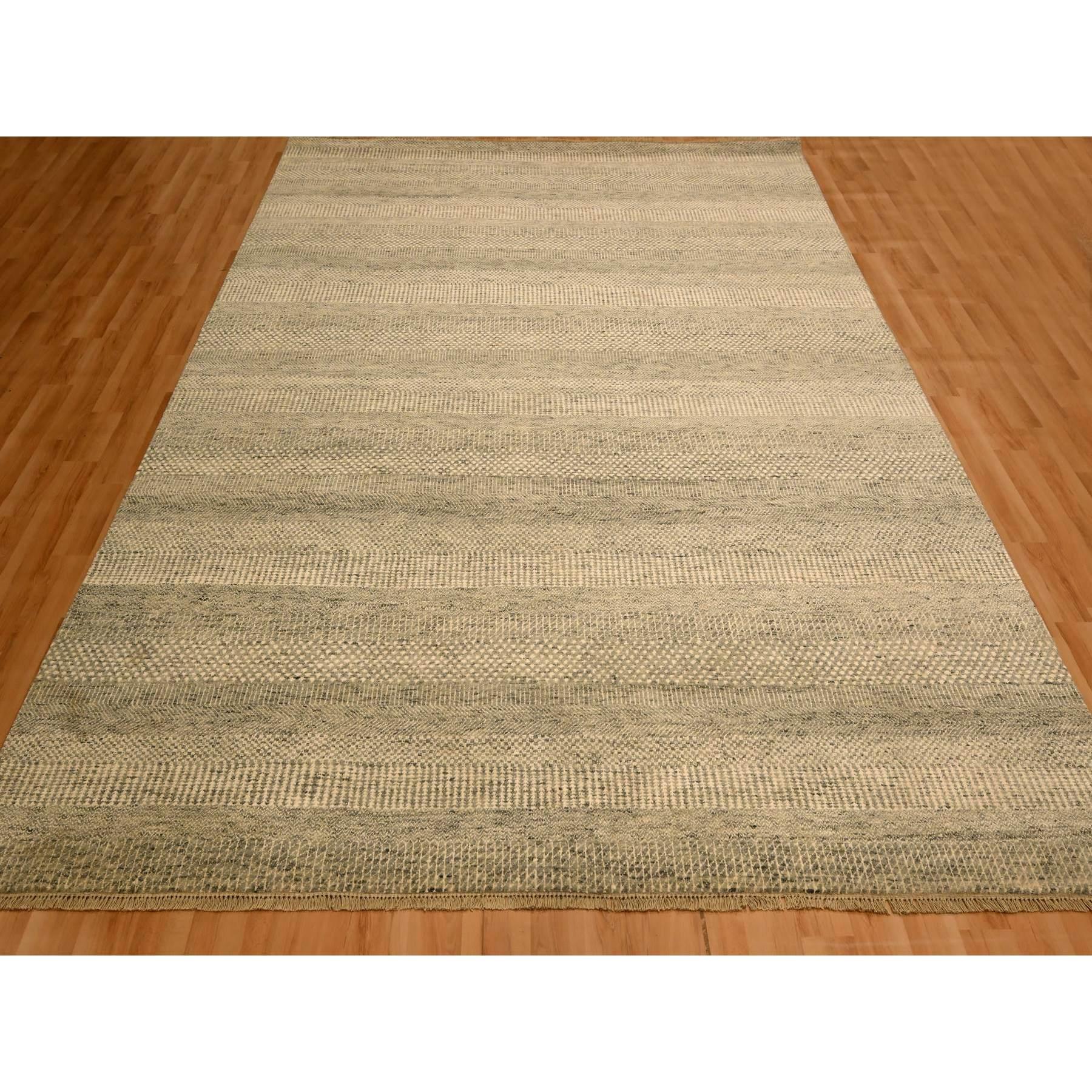 Khaki Brown, Modern Grass Design, Undyed Natural Wool, Tone on Tone, Hand Knotted, Oriental Rug
Primary materials: Wool
Latex: No Pile 
height: 0.25 Inches
Style: Contemporary
Primary color: Brown
Secondary colors: Gray, Beige
Pattern: Oriental