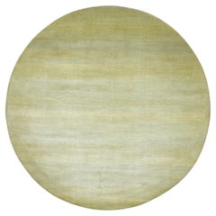 7
10 "x7
10" Tappeto rotondo in lana e seta annodato a mano con design moderno giallo oro.