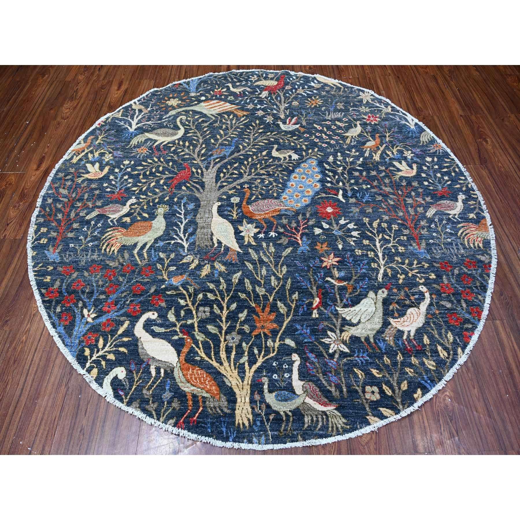 Millennium Blue, Hand Knotted, Organic Wool, Afghan Peshawar with Birds of Paradise, Vegetable Dyes, Round, Oriental Rug
Primary materials: Wool
Latex: No Pile 
height: 0.25 Inches
Style: Transitional
Primary color: Blue
Secondary colors: Red,