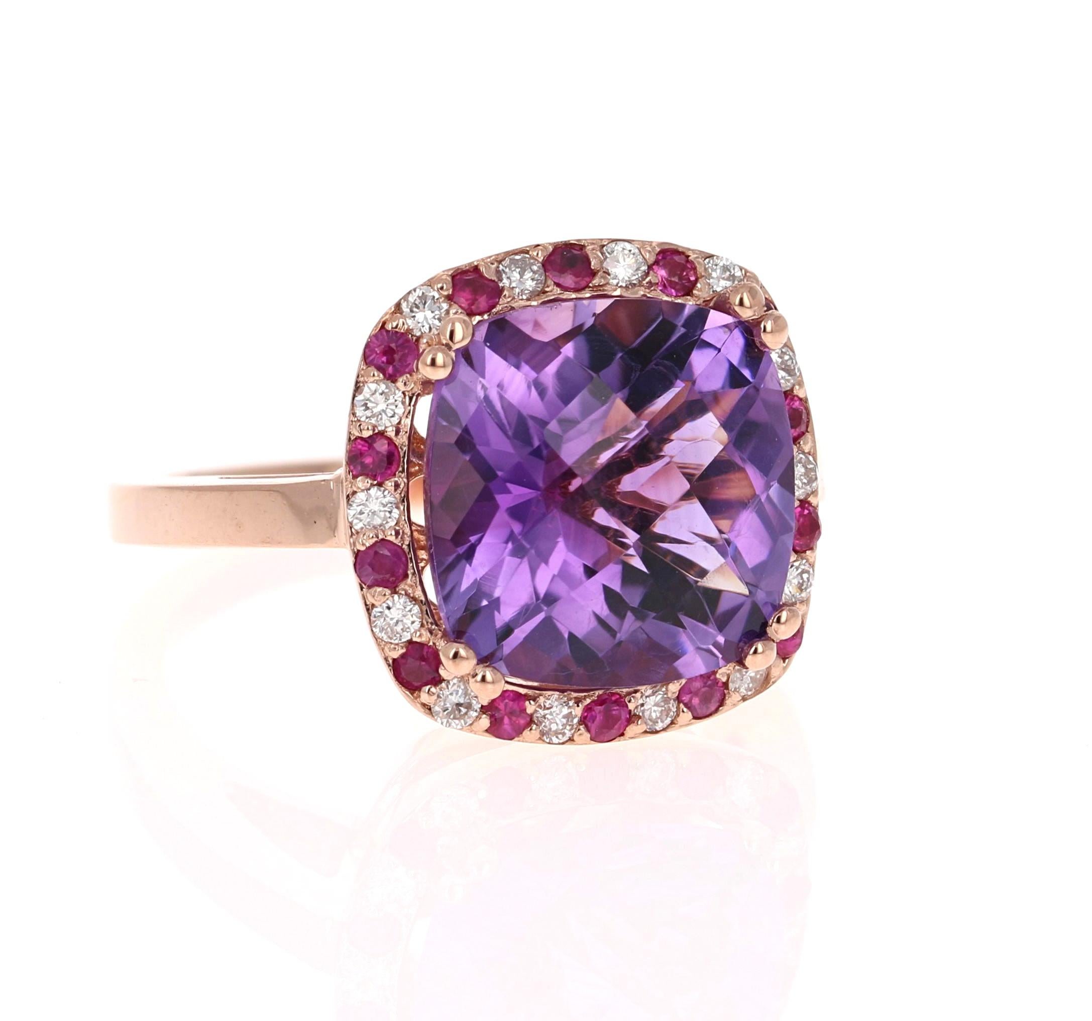 Amethyst, Pink Sapphire, and Diamond Cocktail Ring! 

Playful yet Powerful! Its like having a piece of glittery candy on your finger! This ring has a Checkers Cushion Cut Amethyst that weighs 6.47 Carats and is embellished with alternating 14 Pink
