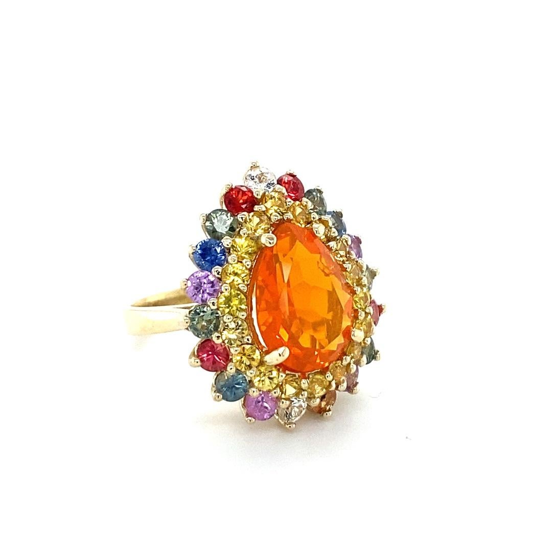 Contemporary 7.11 Carat Pear Cut Natural Fire Opal Sapphire Yellow Gold Cocktail Ring For Sale