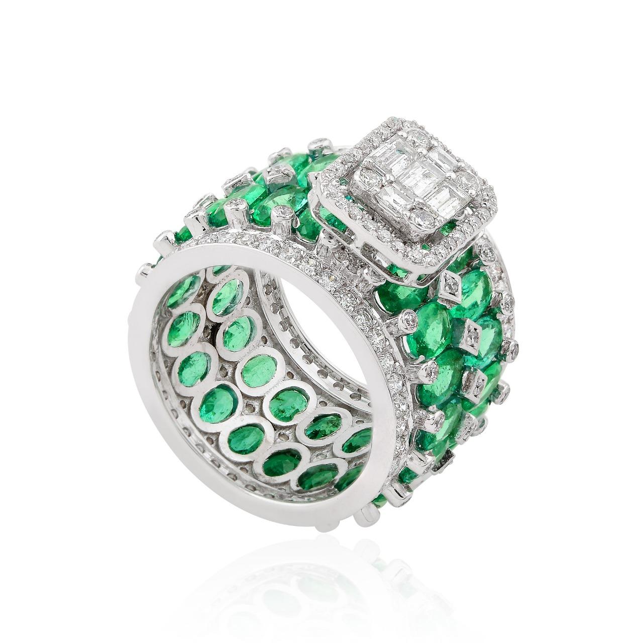 This ring has been meticulously crafted from 14-karat gold.  It is hand set with 7.11 carats emerald & 2.15 carats of sparkling diamonds. 

The ring is a size 7 and may be resized to larger or smaller upon request. 
FOLLOW  MEGHNA JEWELS storefront