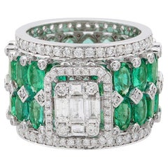 7.11 Carats Zambian Emerald 2.15 Carats Diamond 14 Karat Gold Band Ring
