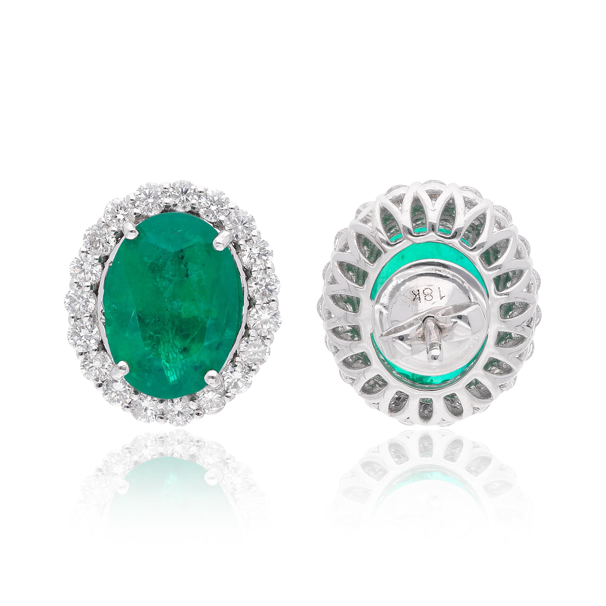 Item Code :- SEE-13108
Gross Wt. :- 6.09 gm
18k White Gold Wt. :- 4.67 gm
Natural Diamond Wt. :- 1.20 Ct. ( AVERAGE DIAMOND CLARITY SI1-SI2 & COLOR H-I )
Natural Emerald Wt. :- 5.91 Ct. 
Earrings Size :- 16 mm approx.

✦