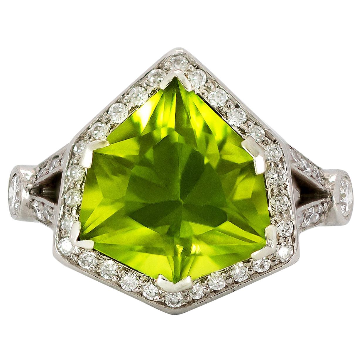 7.12 Carat Fancy Shield-Shaped Peridot with 1.54 Carat Diamond Ring in Platinum For Sale