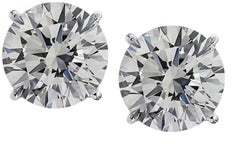 7.12 Carat Matched Pair of Round Cut Diamonds set in solid Platinum