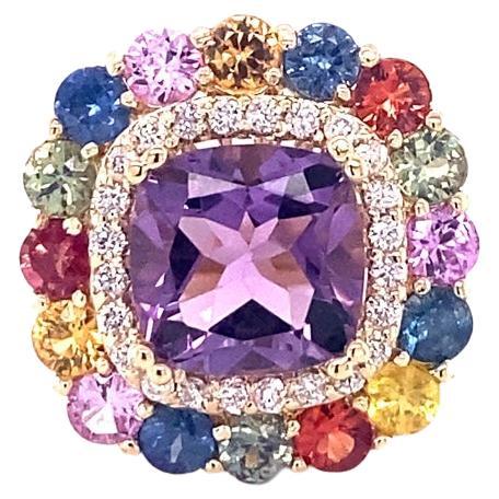 7.13 Carat Cushion Cut Amethyst Sapphire Diamond Yellow Gold Cocktail Ring

Amethyst, Multi-Colored Sapphires and Diamond Cocktail Ring!   A beautiful and sparkly combination of colorful beauty!

This one of a kind piece has been carefully designed