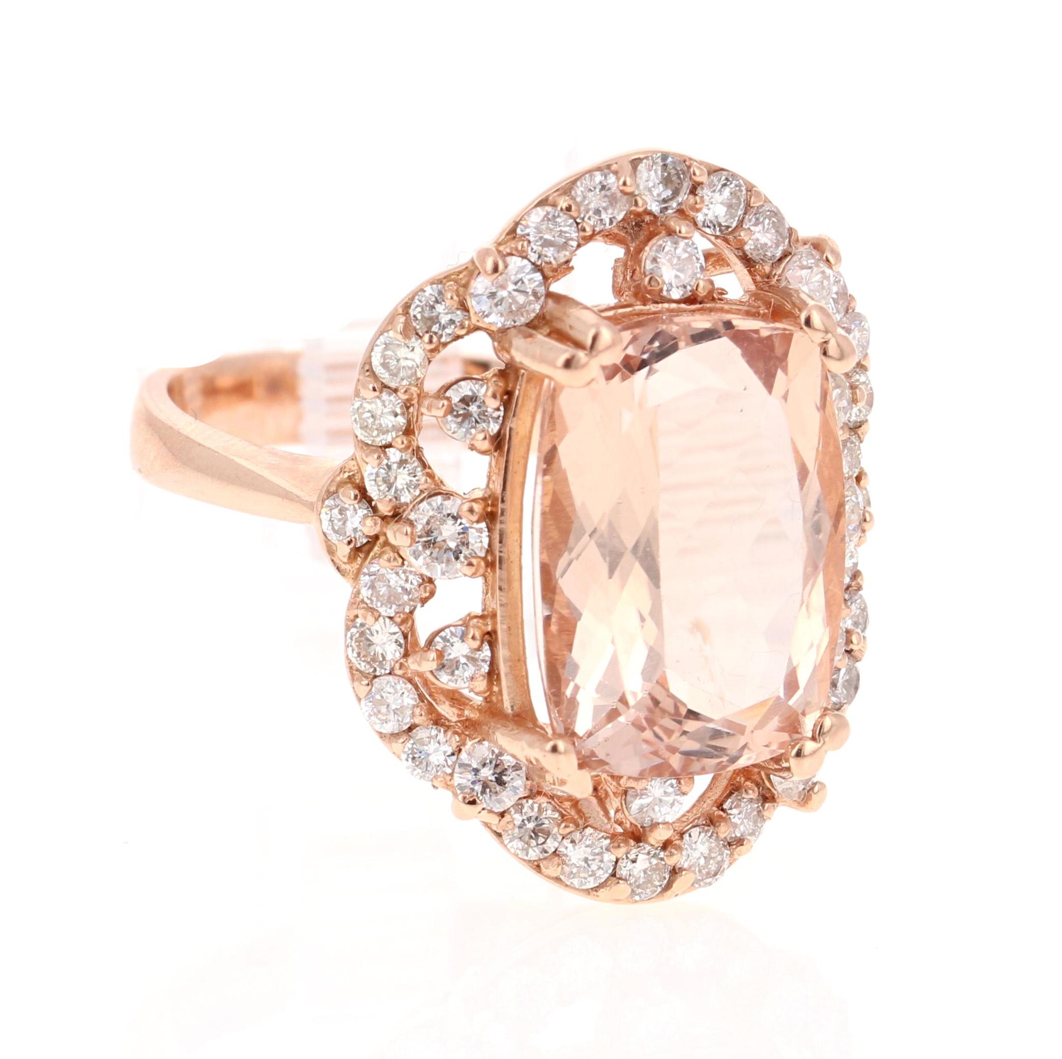 This Morganite ring has a beautiful 6.07 Carat Oval-Cushion Cut Morganite and is surrounded by 40 Round Cut Diamonds that weigh 1.06 Carats. The total carat weight of the ring is 7.13 Carats. 

The measurements of the Morganite are 10 mm x 14 mm and