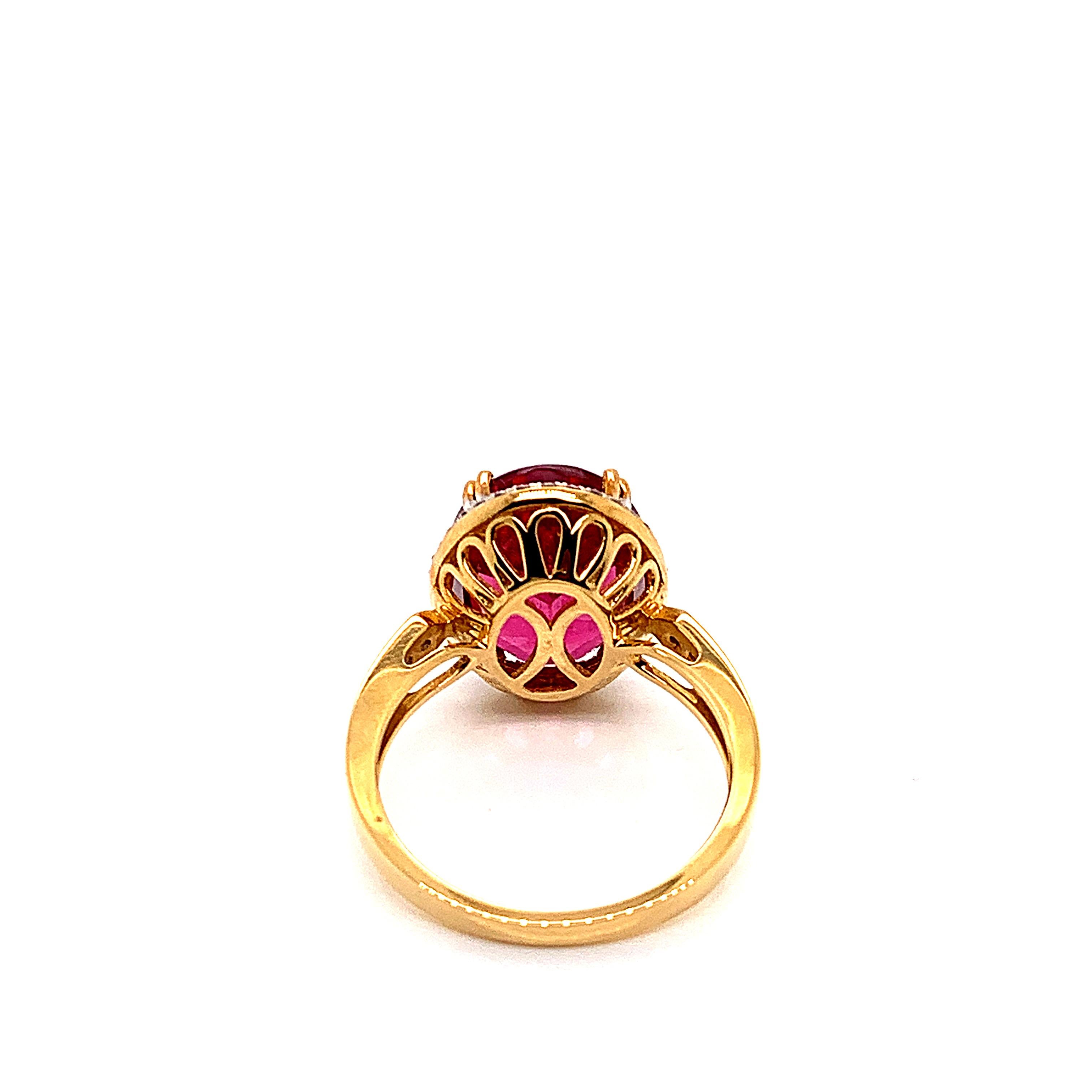 Oval Cut 7.13 Carat Oval Shaped Rubelite Ring in 18 Karat Yellow Gold with Diamonds For Sale