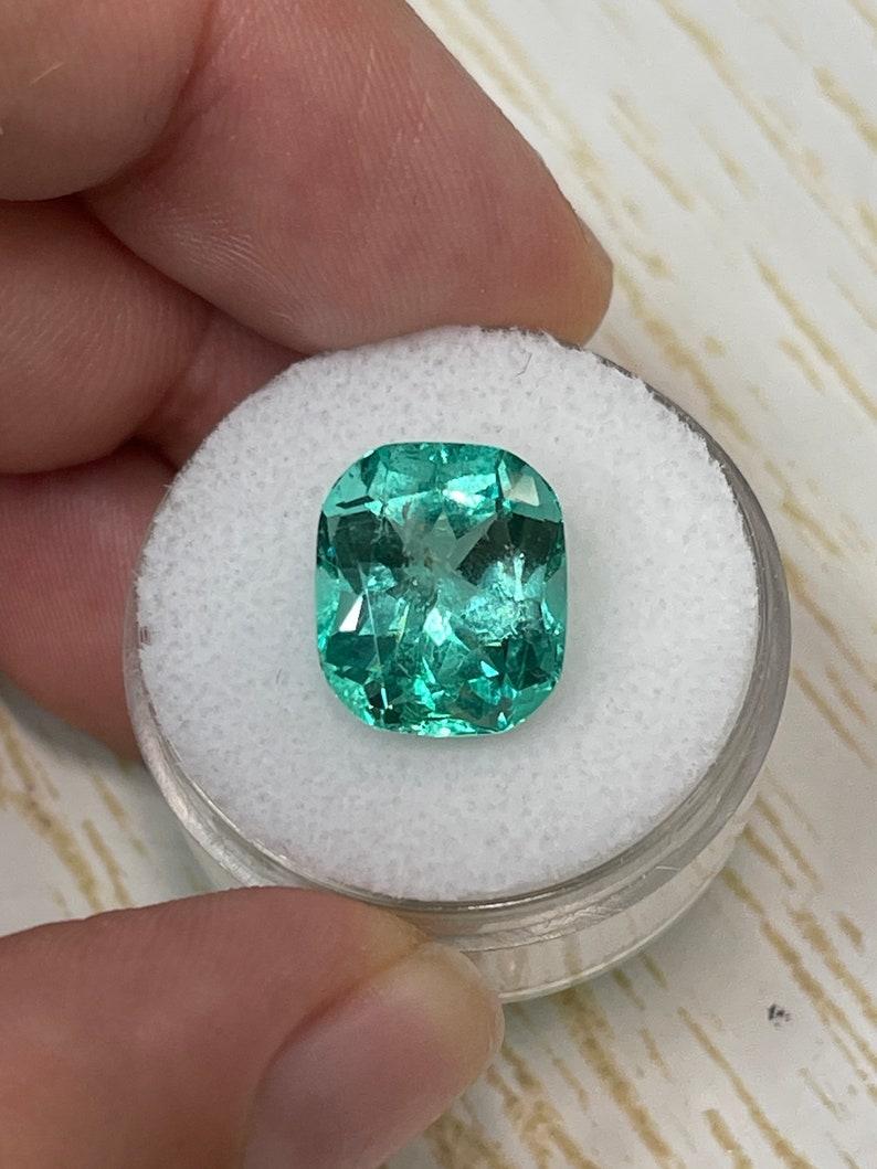 Modern 7.13 Carat Vivacious Bluish Green Colombian Emerald - Chivor Cushion Cut Gem For Sale