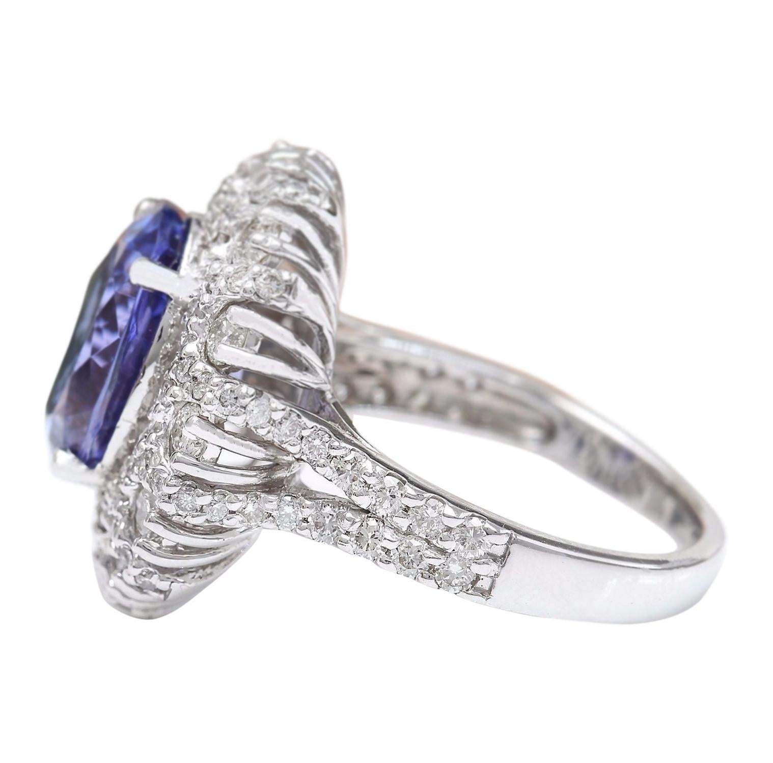 Modern Exquisite Tanzanite Diamond Ring In 14 Karat Solid White Gold For Sale