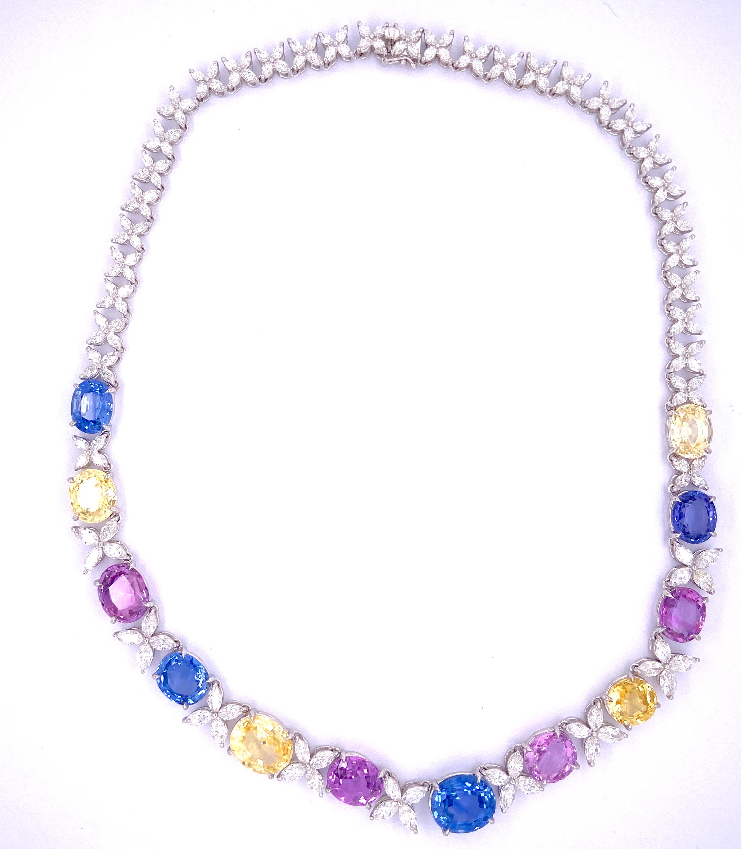 71.49 Carat GIA Certified No Heat Fancy Coloured Sapphires and White Diamond Gold Necklace:

A rare and beautiful necklace, it features incredibly gorgeous 71.49 carat unheated fancy coloured sapphires along with white marquise shaped diamonds