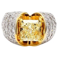 Bague en or bicolore 7.14ct Fancy Light Yellow Radiant Cut VVS2 
Round Diamond