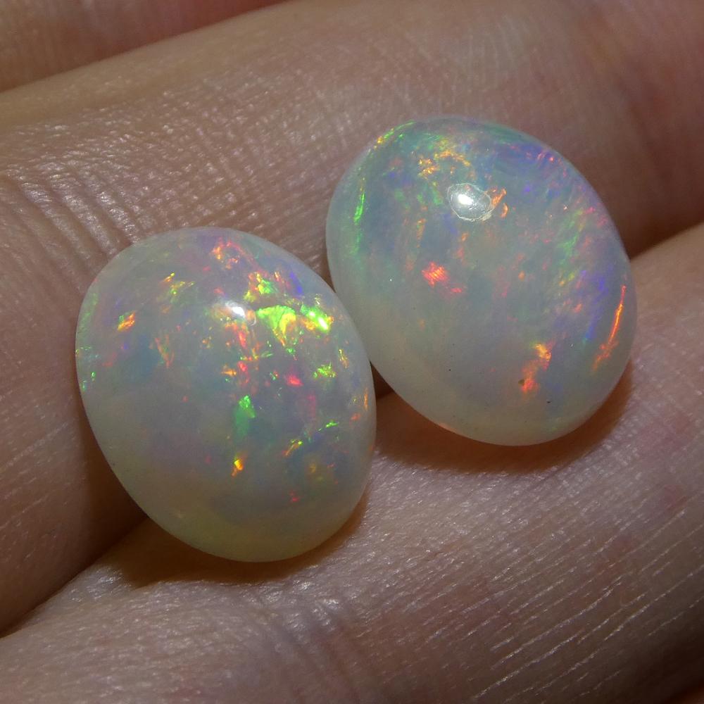 Coppia di cristalli opali ovali cabochon 7.14ct in vendita 7