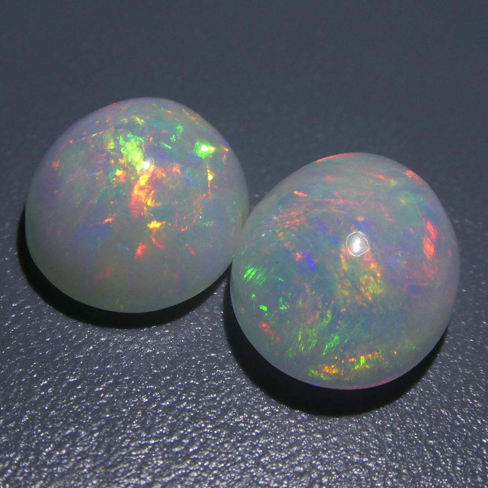 Oval Cut 7.14ct Oval Cabochon Crystal Opal Pair For Sale