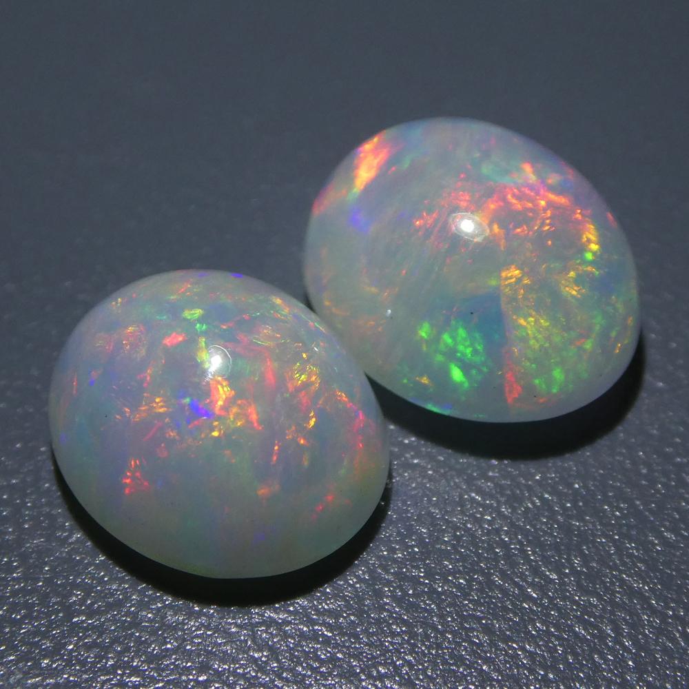 Women's or Men's 7.14ct Oval Cabochon Crystal Opal Pair For Sale