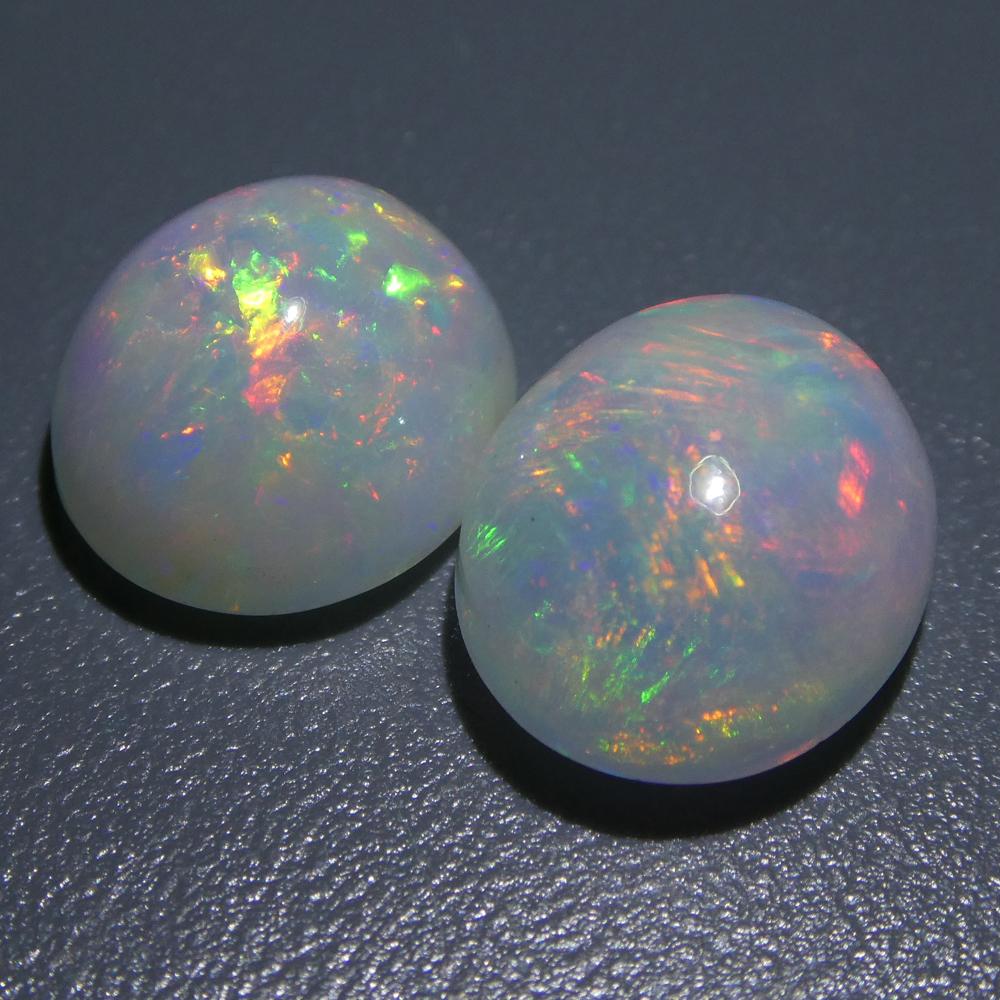 Coppia di cristalli opali ovali cabochon 7.14ct in vendita 2