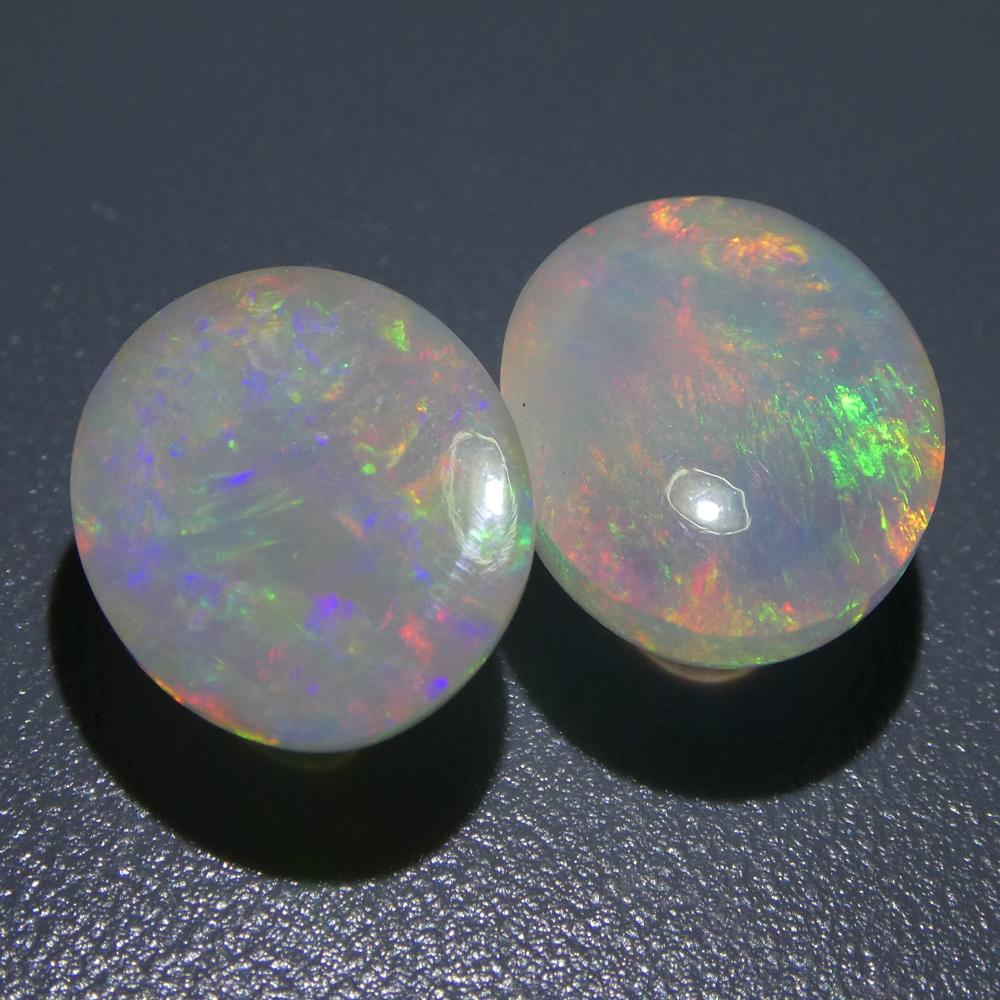 Coppia di cristalli opali ovali cabochon 7.14ct in vendita 3