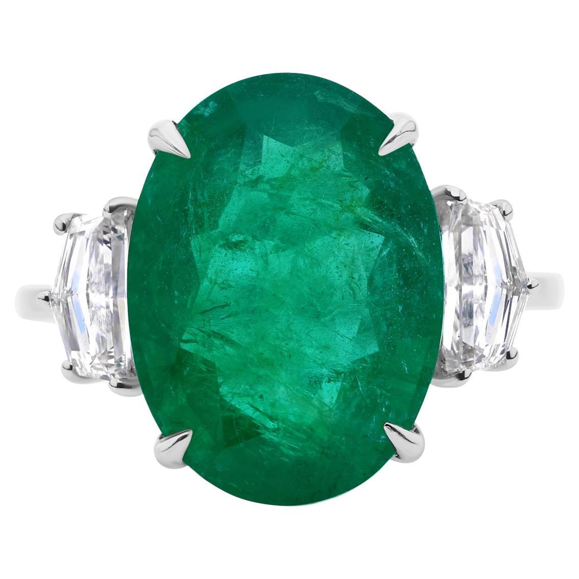 7.14ct Oval Emerald 0.81ct Cadillac Cut Diamond Three Stone Ring 14K White Gold