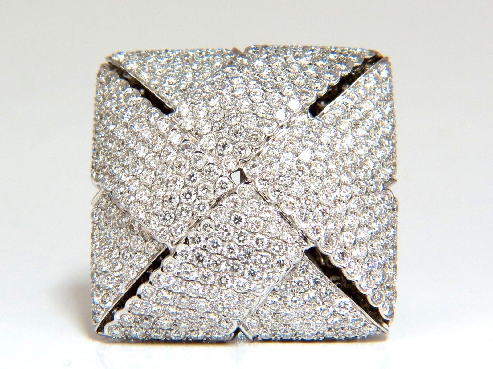 Contemporary three dimensional ring.


Unisex Cross Weave Pattern

7.15ct. Natural brilliant round diamonds
Vs-2 clarity  F color.

550 diamonds count

18kt white gold.

24 Grams

Overall ring: 1.07 x 1.09 inch 

11mm depth

Current ring size: