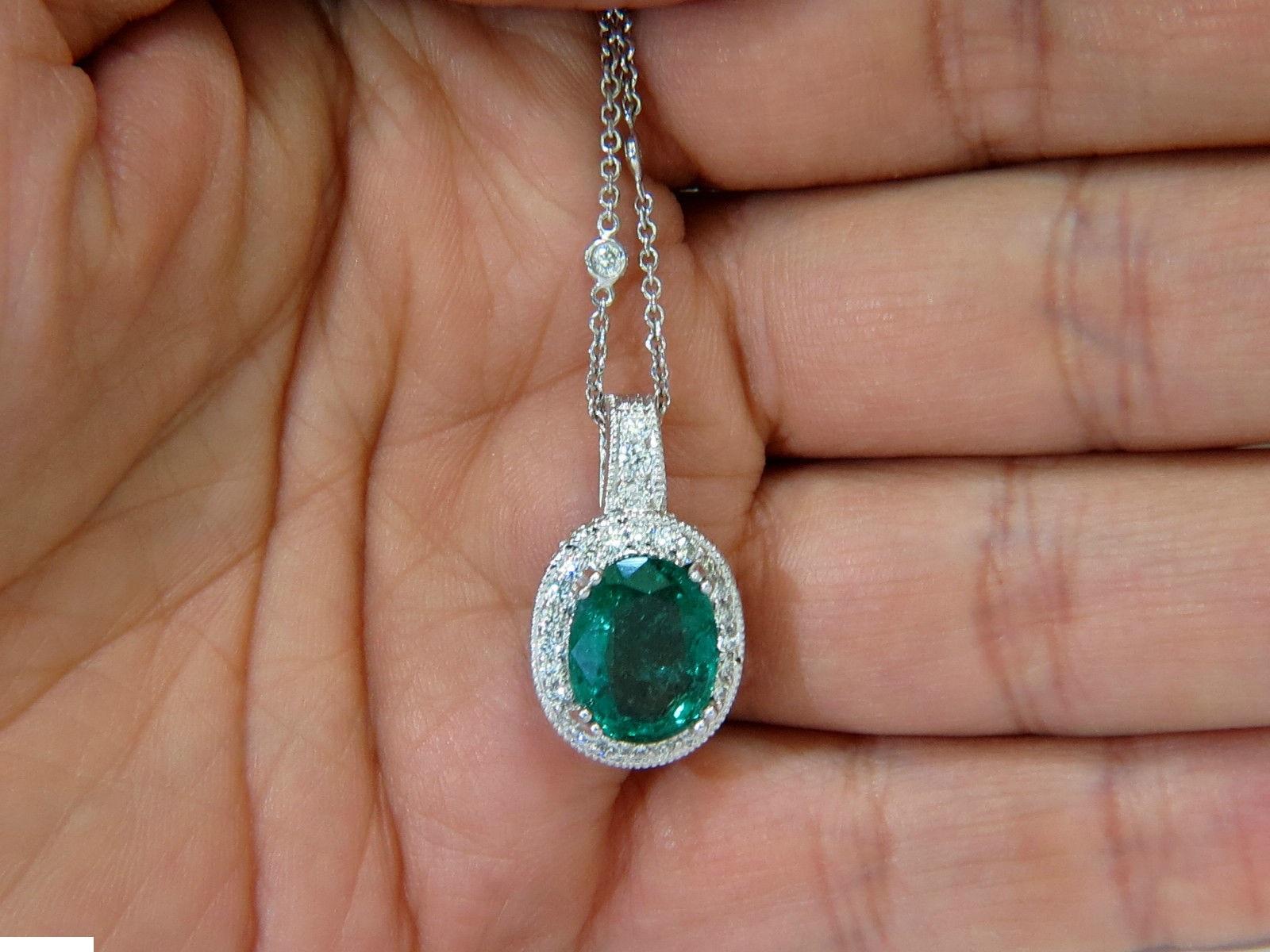 4.65ct. Natural emerald

Vivid green, excellent luster

clean clarity and transparent



(13) Diamonds on chain necklace



Emerald is mounted in diamonds pendant

With diamonds all around even on sides



Total weight of diamonds (pendant &
