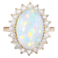 Natürlicher Opal-Diamantring aus 14 Karat Gelbgold 