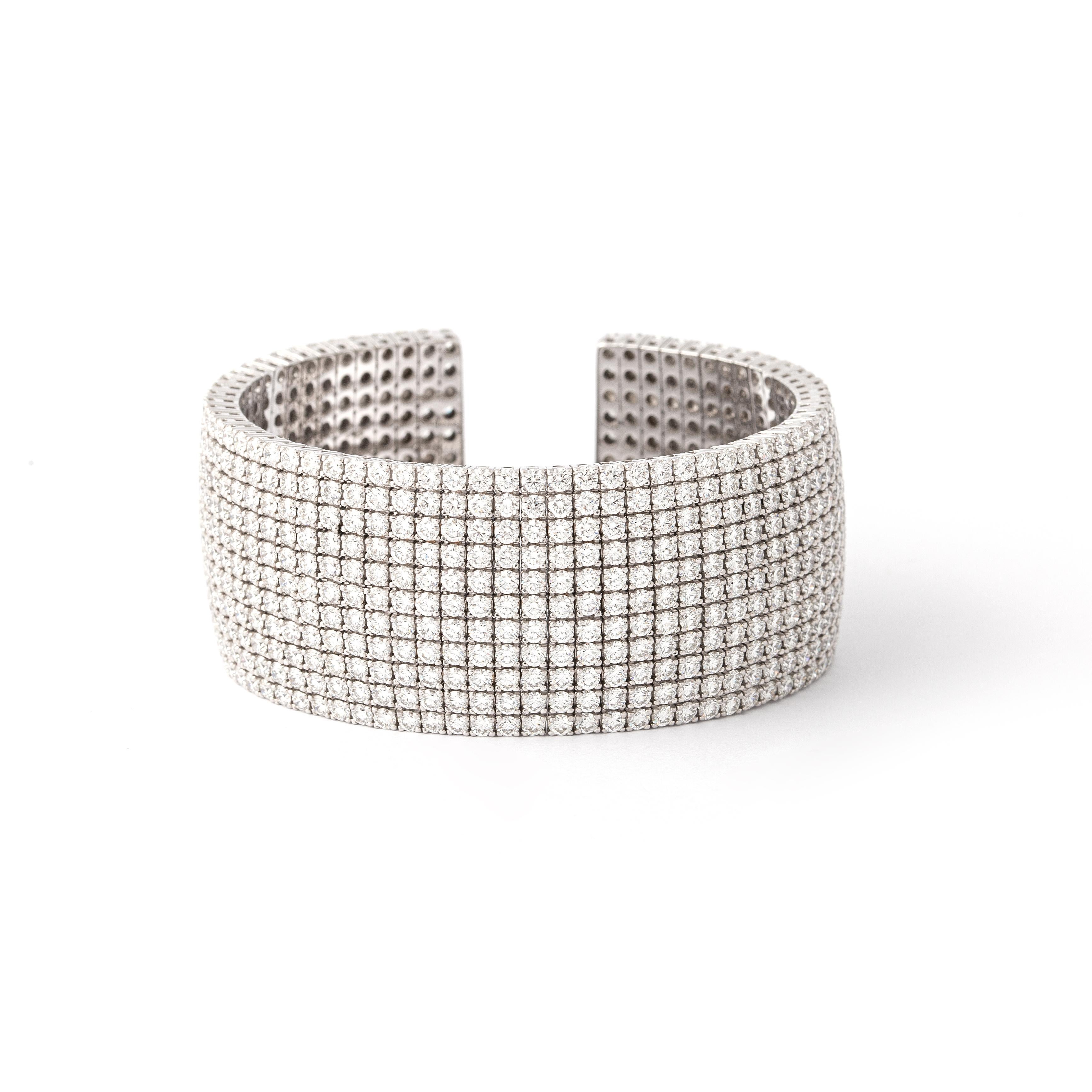 Bangle in 18kt white gold set with 715 diamonds 32.14 cts G VS1  

Inner circumference: Approximately 16.02 centimeters (6.31 inches) up to 17.27 centimeters (6.80 inches).

Note: Flexible Bracelet.

Total weight: 104.42 grams.

Width: 2.6