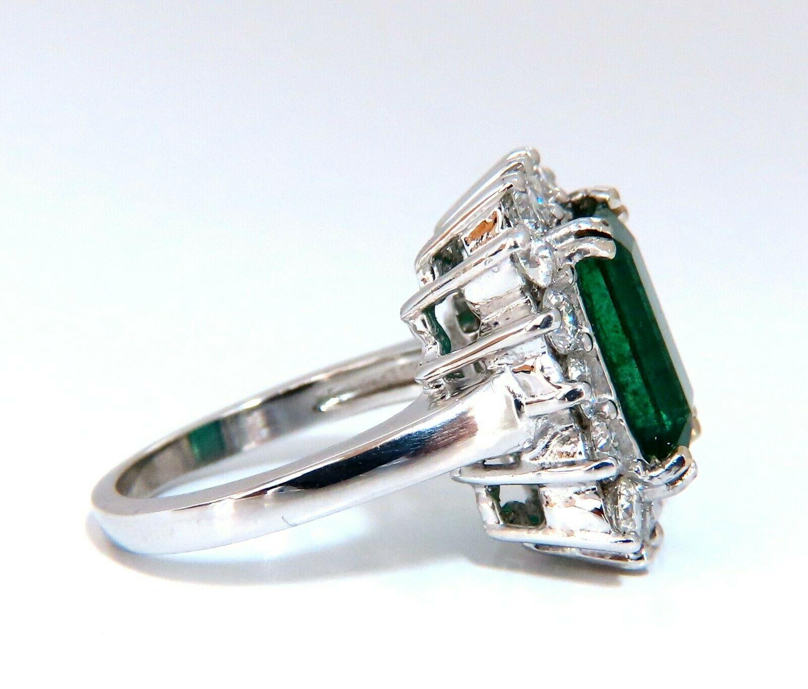 Prime Halo Mod Deco Green.

5.40ct. Natural Emerald Ring

Emerald, Brilliant cut

12 x 8.3mm Diameter

Transparent & Vivid Green 

1.75ct. Diamonds.

Round & full cuts 

G-color Vs-2 clarity.  

14kt. white gold

9.9 grams

Ring Current size: