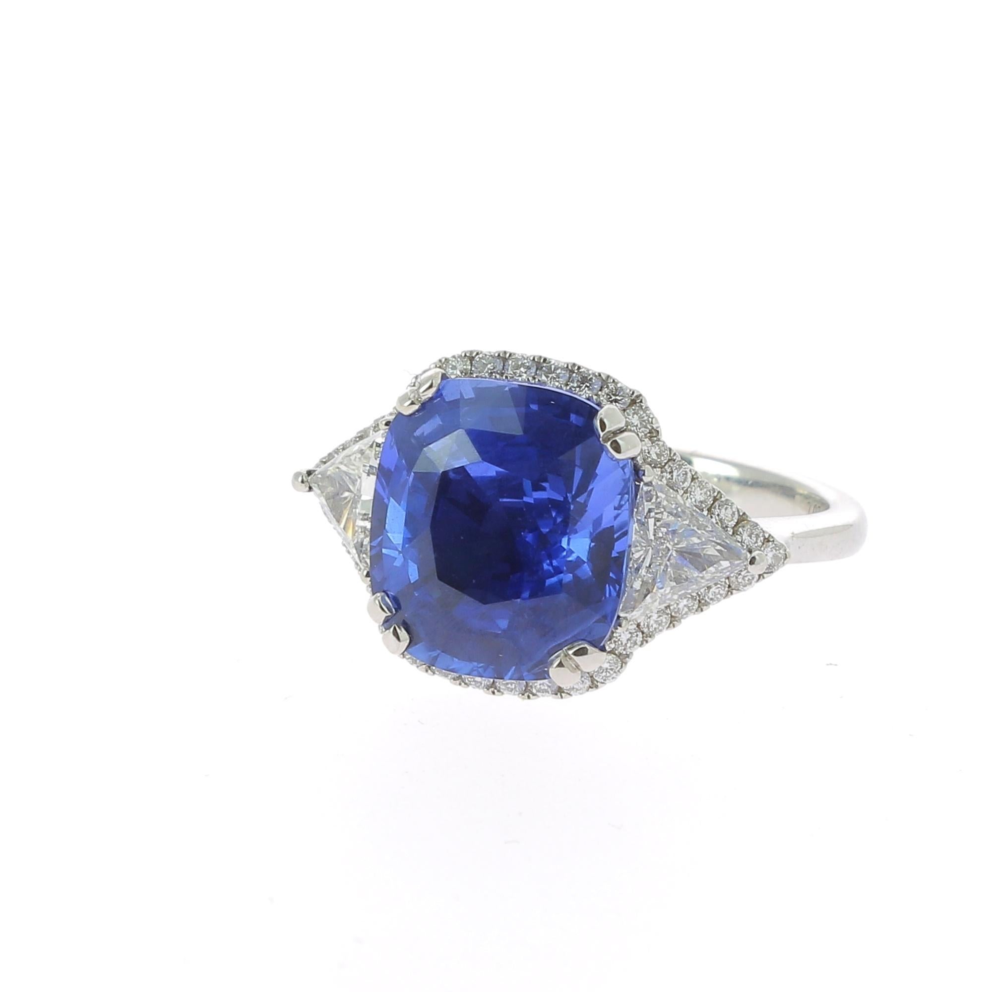 Oval Cut 7.16 Carat Ceylon Intense Blue Sapphire Cocktail Ring Set with Round Diamond