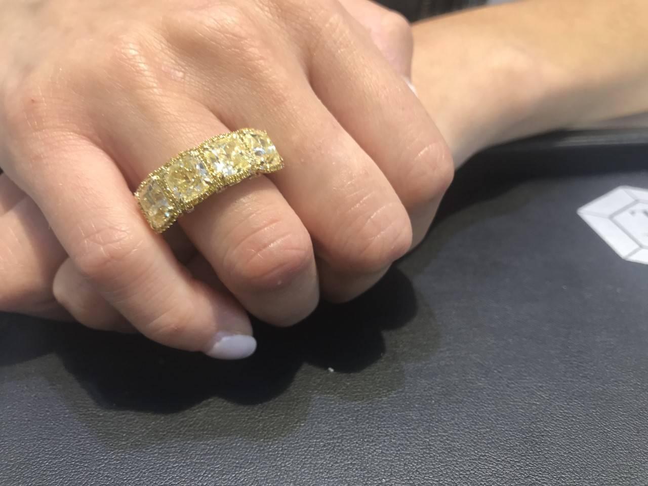 Women's 7.16 Carat Fancy Yellow Cushion Round Diamond 18 Karat Gold Halo Ring For Sale