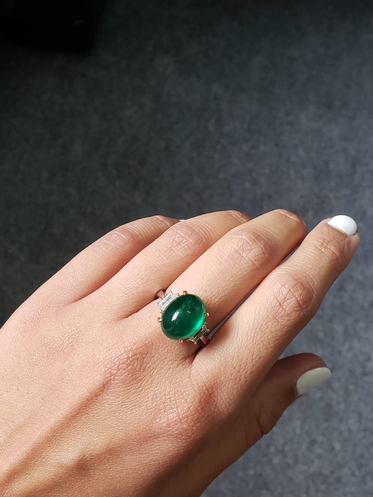 Oval Cut 7.17 Carat Emerald Cabochon and Diamond Three-Stone Ring