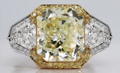 7.17 Carat Fancy Yellow Radiant Cut Diamond 3-Stone Engagement Ring GIA VS1