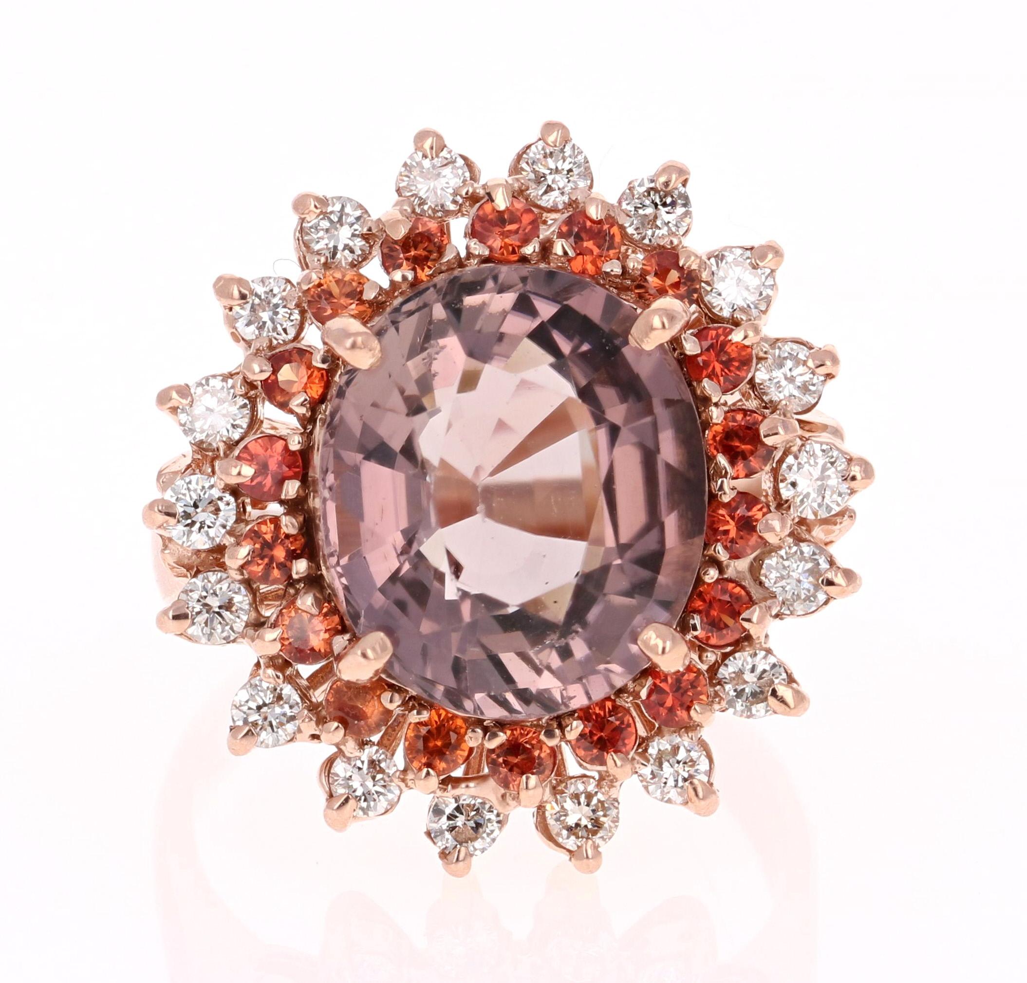 Stunning and uniquely designed 7.17 Carat Tourmaline, Sapphire and Diamond Rose Gold Cocktail Ring!

This ring has a 5.98 carat Oval Cut Tourmaline that is set in the center of the ring and is surrounded by 18 Round Cut Orange Sapphires that weigh