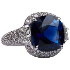 7.18 Blue Sapphire and Diamond Three-Stone Ring