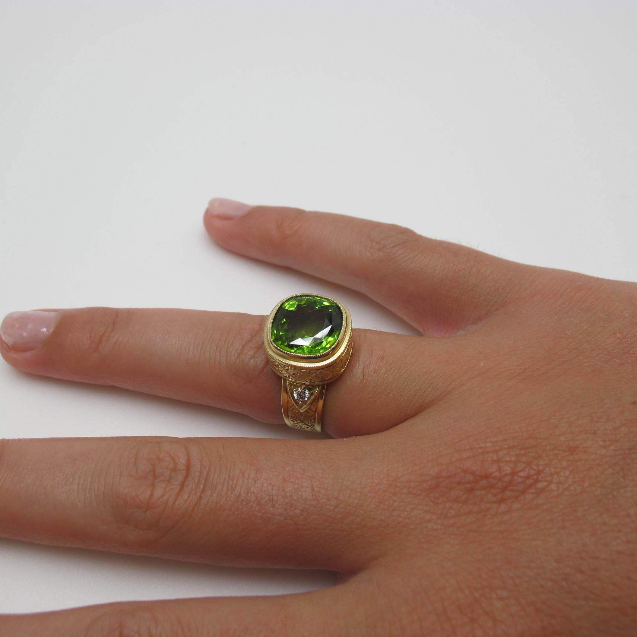 Artisan 7.18 Carat Peridot with .05 Carat Diamonds 18 Karat Yellow Gold Ring