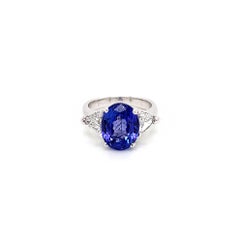 Anillo de mujer de tres piedras con tanzanita y diamantes de 7,18 quilates en total