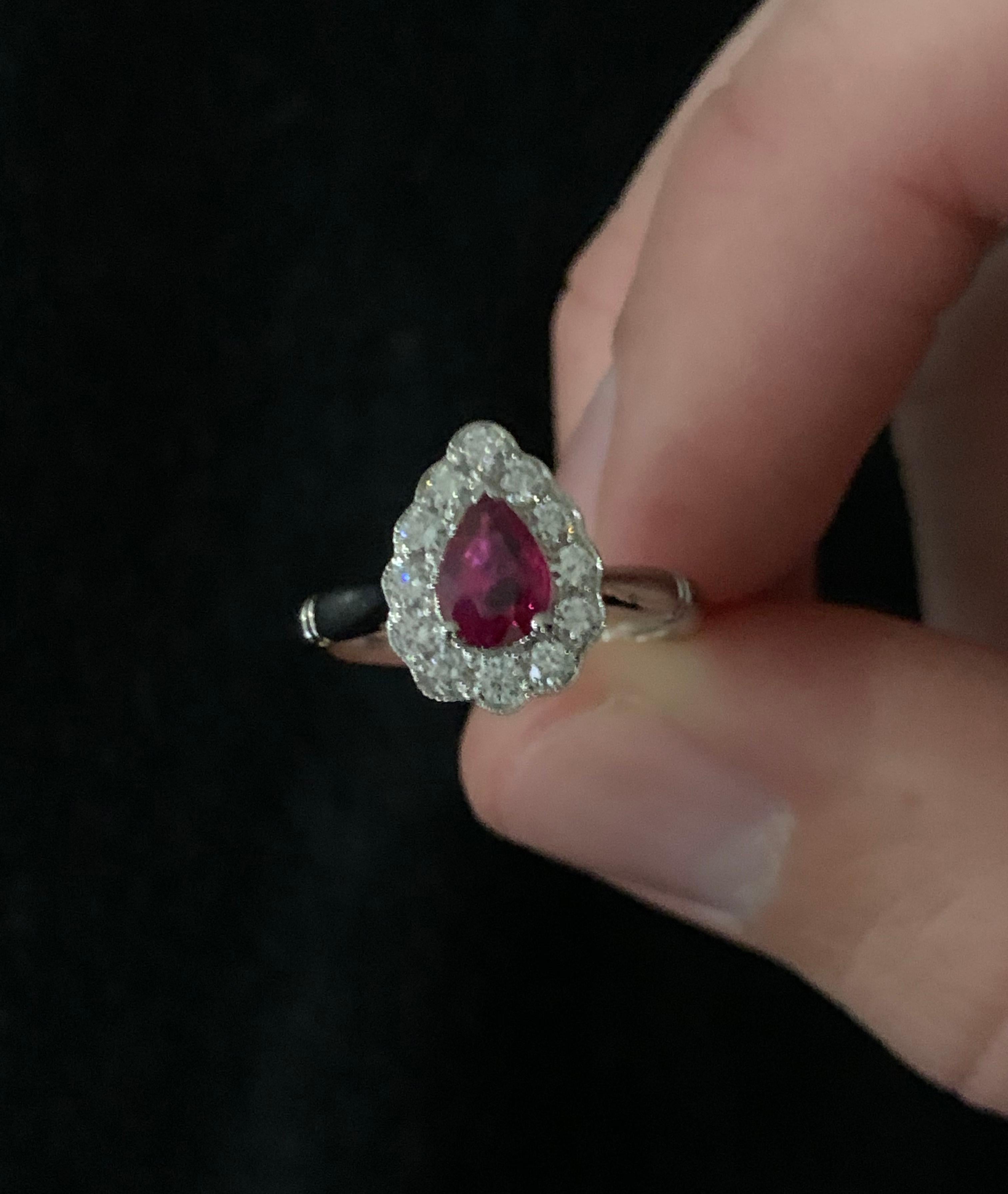 Modern .71 Carat Pear Cut Ruby Set in 0.36 Carat Diamond Surround of 18 Carat Gold For Sale