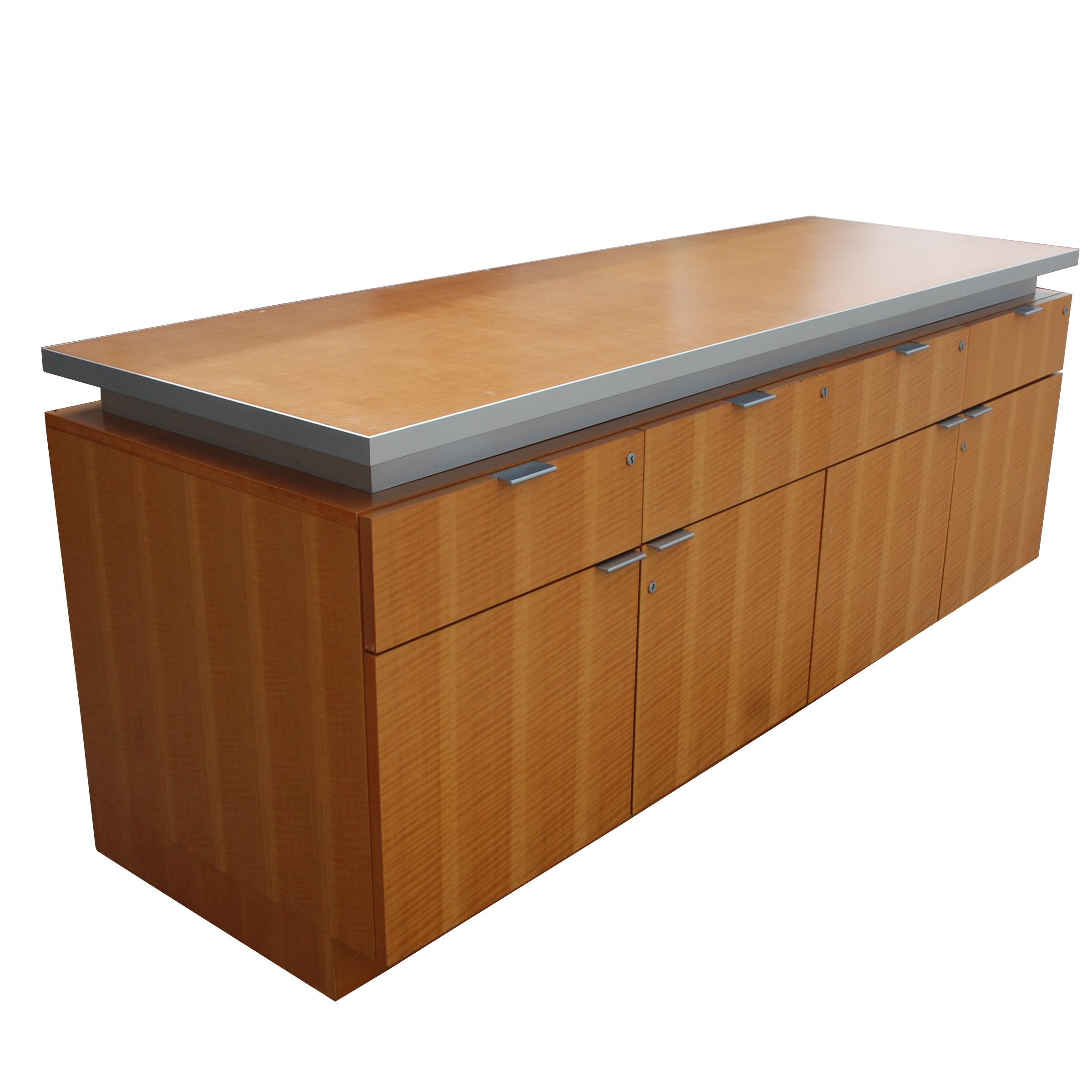 Bernhardt Credenza

A rare modern chrome and maple credenza.
4 drawers with ample storage underneath with shelving.
Chrome pulls. Marked Bernhardt.

See pedestal desk also available. Measure: 72