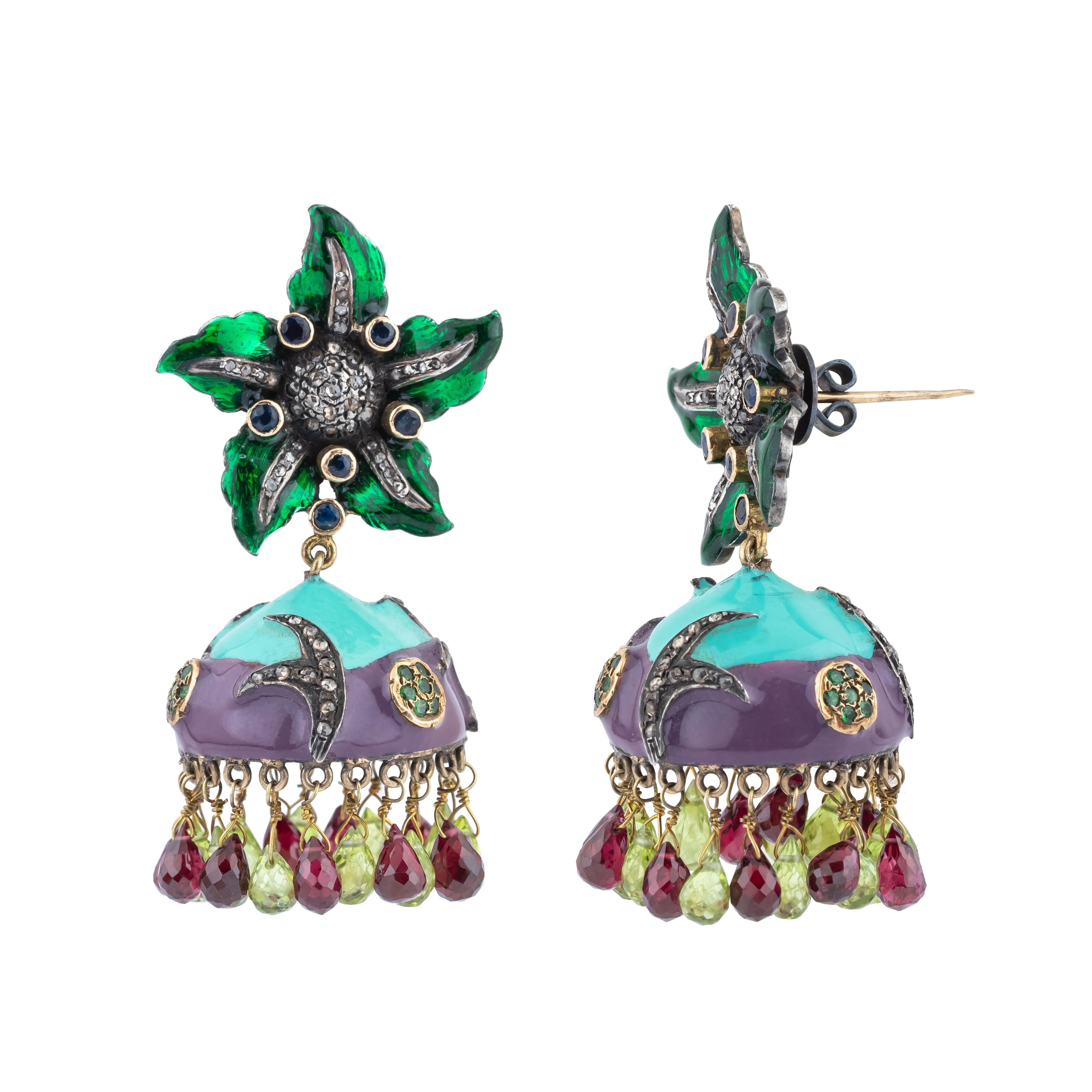 A true masterpiece of design, the 7.2 Carat Diamond and Mixed Stones Drop Earrings celebrate the harmony of luxury and artistry. The centerpiece of these earrings is the brilliant diamonds, expertly cut to radiate light with stunning intensity.