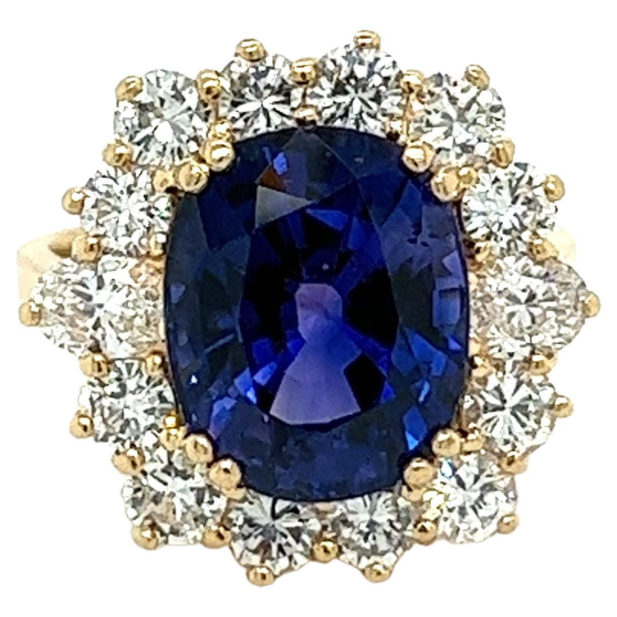 7.2 Carat Oval Cut Blue Sapphire & Diamond Halo Ring in 14K Yellow Gold For Sale