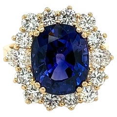 7.15 Carat Oval Cut Blue Sapphire & Diamond Halo Ring in 14K Yellow Gold